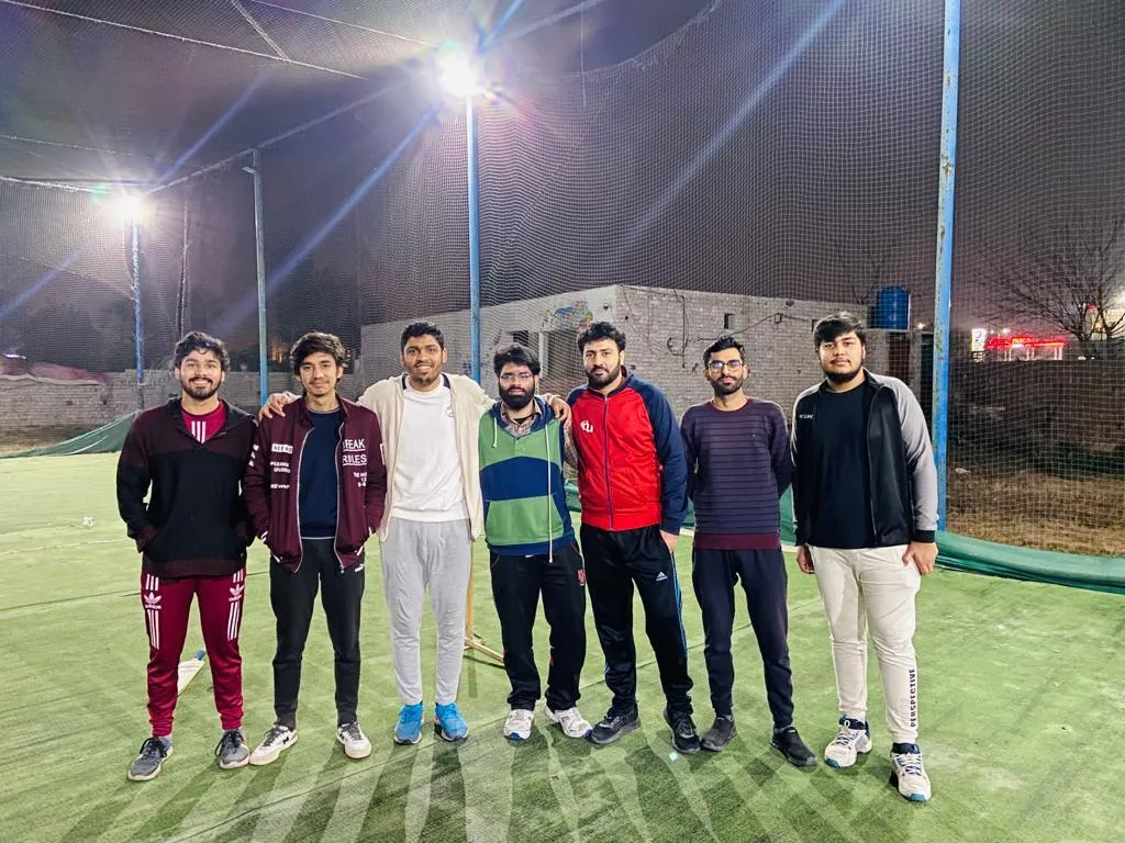 The Data Prism team on a cricket pitch