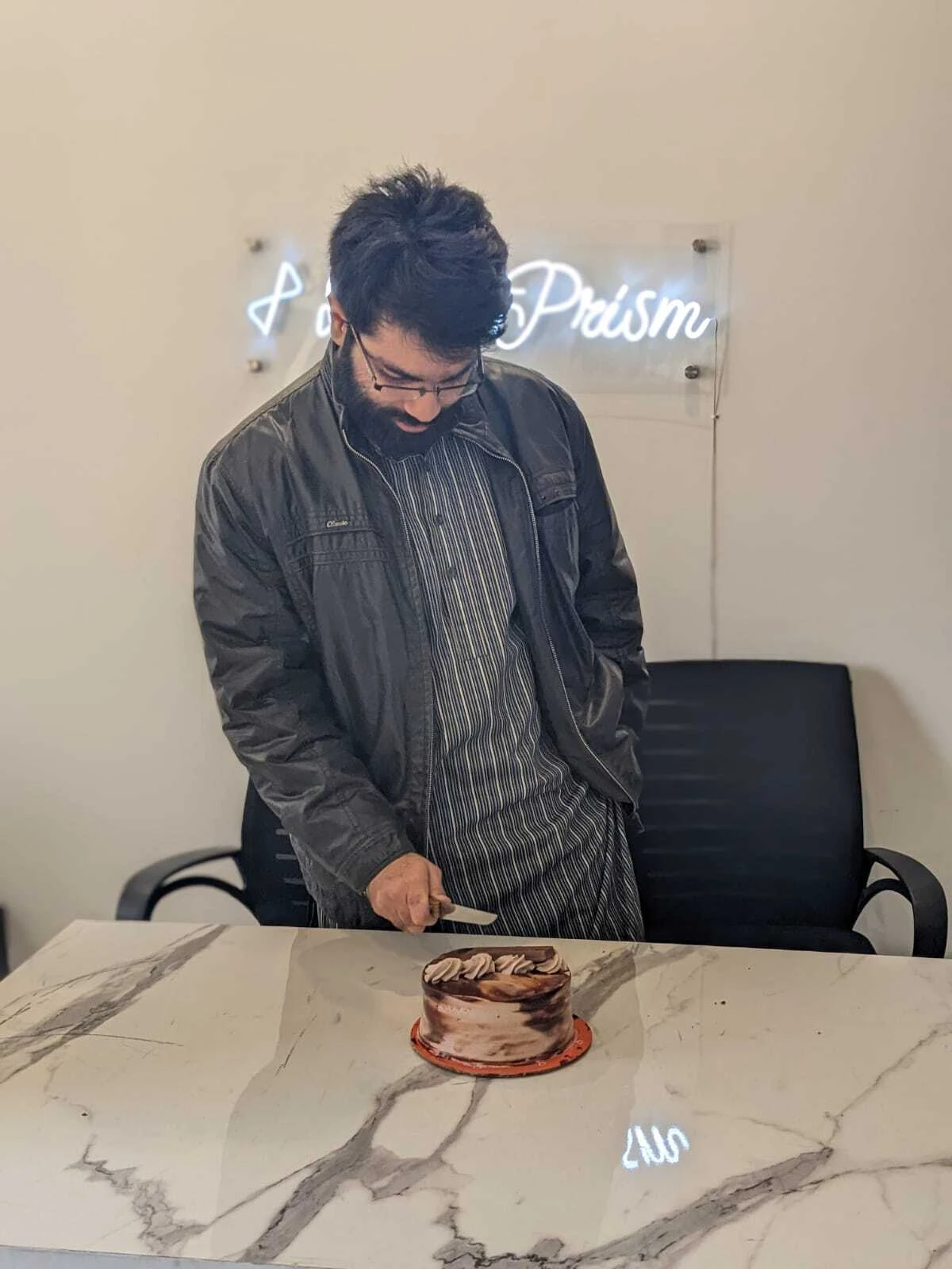 A Data Prism team member celebrating at the office
